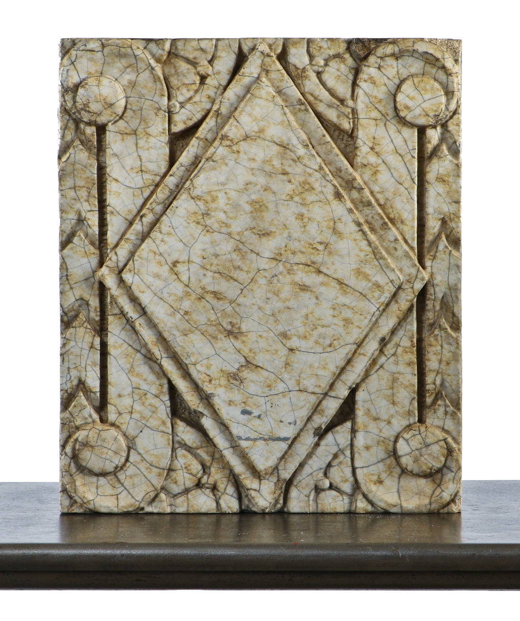 original c. 1930's american depression era art deco style nortown theater speckled glazed terra cotta facade panel featuring a centrally located tiered diamond with surrounding volutes