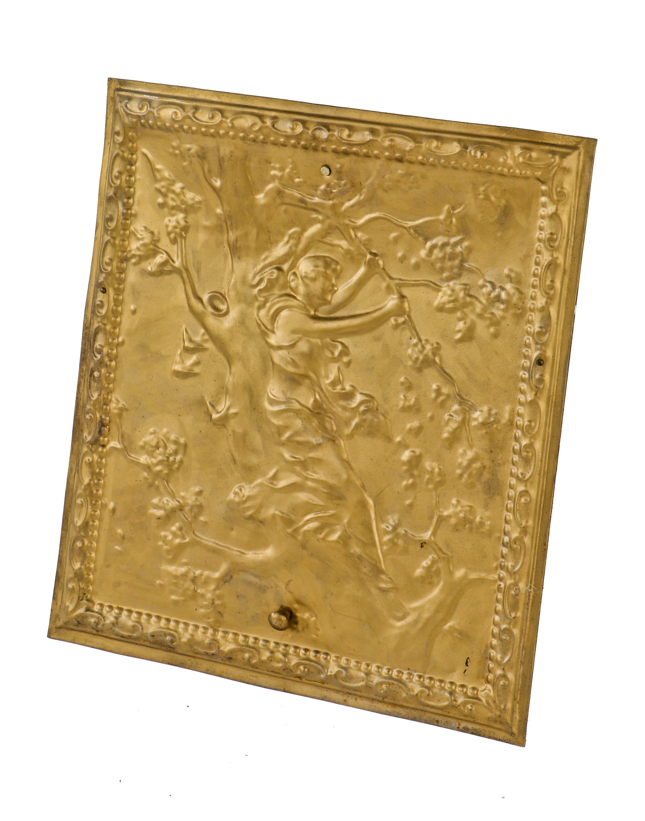 single late 19th or early 20th century original antique american metallic gold enameled stamped steel interior residential fireplace summer cover with maiden resting against a tree