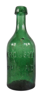 remarkably intact privy-dug c. 1847 light to medium emerald green iron- pontiled mineral water bottle manufactured for philadelphia bottler eugene roussel