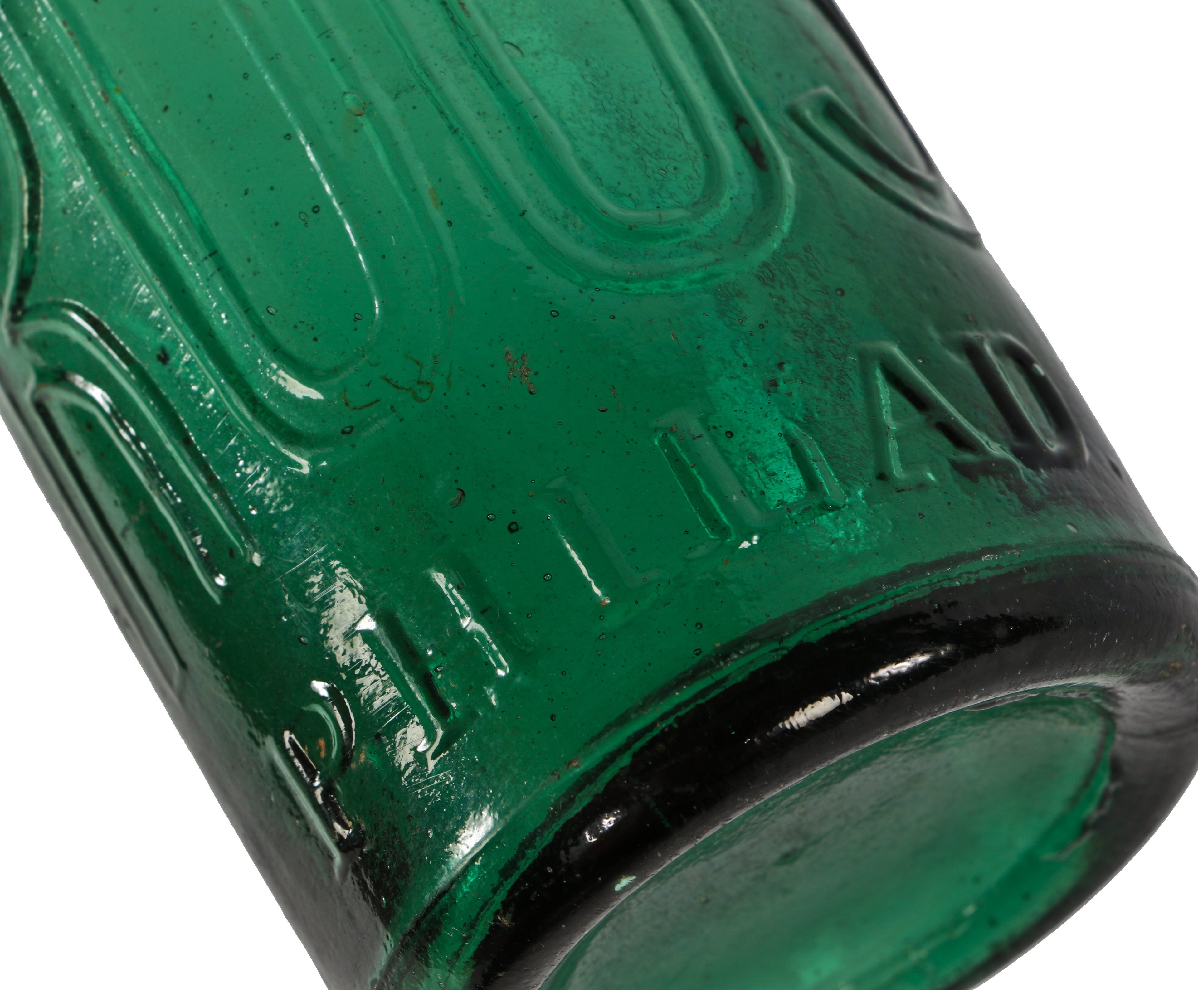 original and intact mid-nineteenth century antique american emerald green glass iron-pontiled soda bottle manufactured for philadelphia bottler eugene roussel.