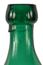 original and intact mid-nineteenth century antique american emerald green glass iron-pontiled soda bottle manufactured for philadelphia bottler eugene roussel.