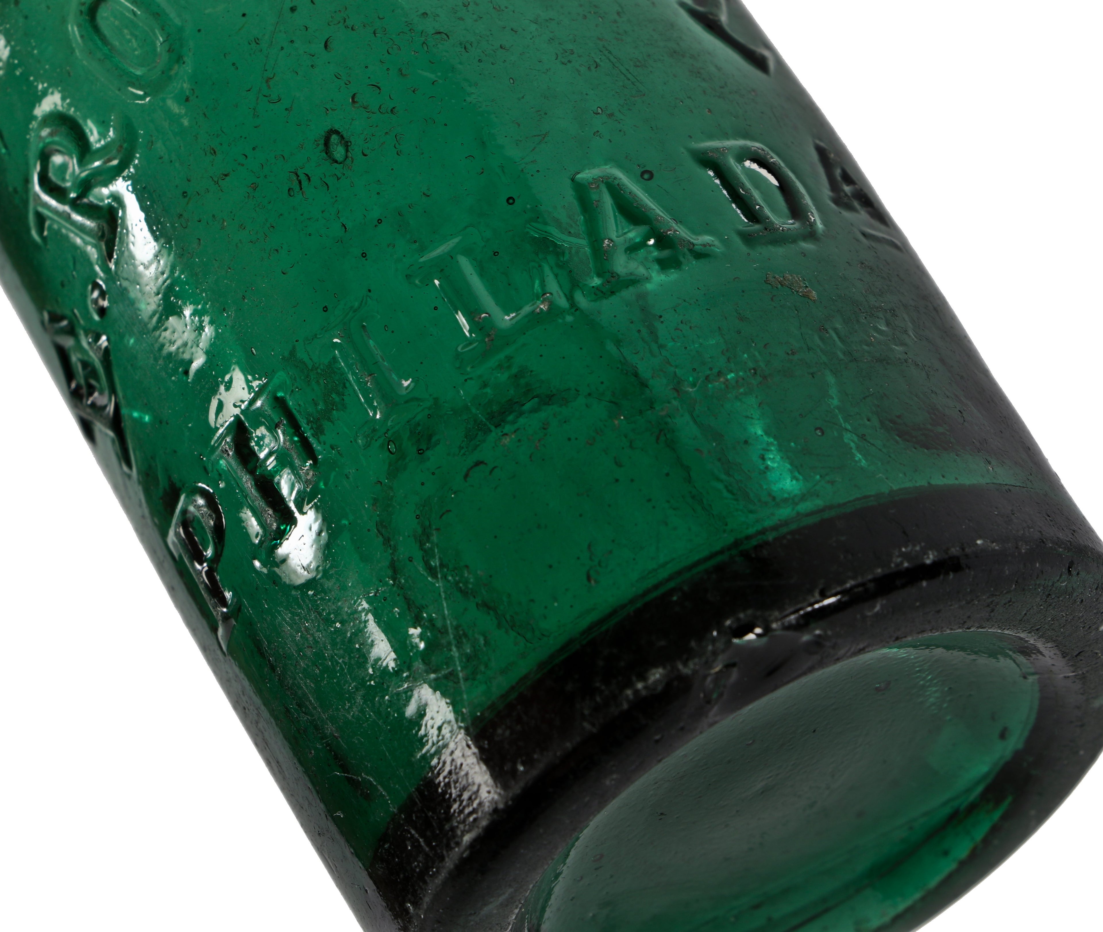 original early 1860's single largely intact deep emerald green smooth base soda bottle manufactured for philadelphia bottler eugene roussel with applied blobtop