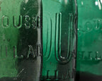 remarkably intact privy-dug c. 1847 light to medium emerald green iron- pontiled mineral water bottle manufactured for philadelphia bottler eugene roussel
