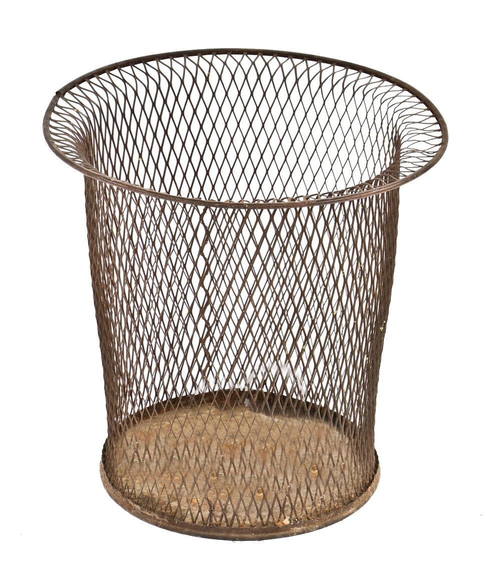 single nicely worn and weathered american industrial low-lying expanded metal factory or commercial building "nemco" waste can with rolled rim and stamped metal bottom