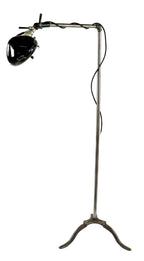 repurposed vintage american industrial freestanding three-legged threaded steel pipe reading or floor lamp with depression era adjustable police cruiser spotlight