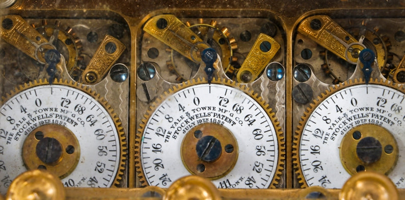 one of two nearrly matching original antique american c. 1919-20 machined cast bronze "stockwell's patent" three-movement noel bank vault door time clock
