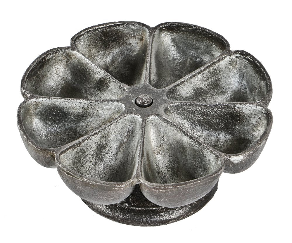 single early 20th century antique american industrial revolving cast iron cobbler's compartmentalized nail cup with uniform brushed metal finish