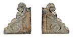 two matching elegantly designed early 20th century standard brewery corner saloon carved limestone exterior roofline brackets or corbels with age appropriate wear