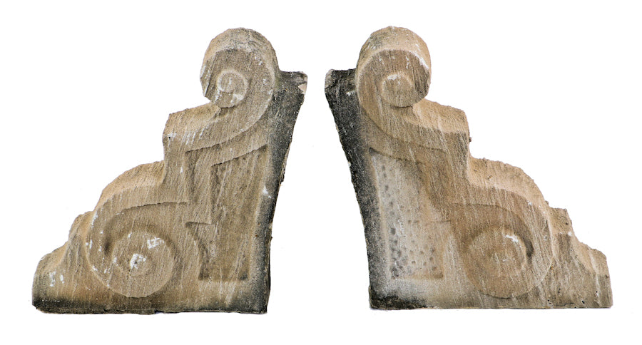 pair of identical early 20th century antique american carved solid limestone historic standard brewery saloon corner building roofline ornament with volutes