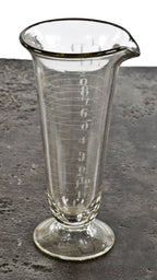 original early 20th century antique american medical or apothecary druggists' wheel cut or acid-etched pedestal base laboratory measure with conical-shaped body