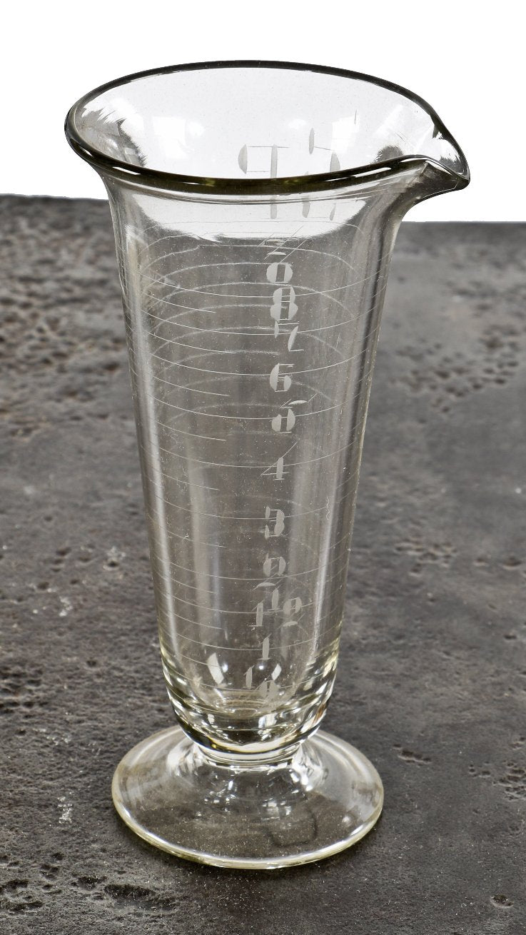 original early 20th century antique american medical or apothecary druggists' wheel cut or acid-etched pedestal base laboratory measure with conical-shaped body