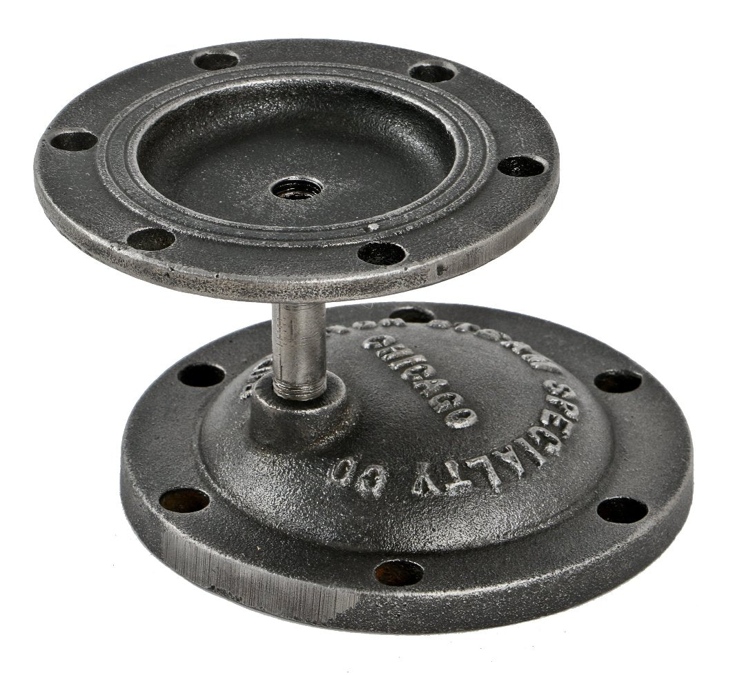 single antique american industrial boylston steam specialty brushed cast iron bonnets or flanges repurpsoed into a diminutive artifact display stand or riser