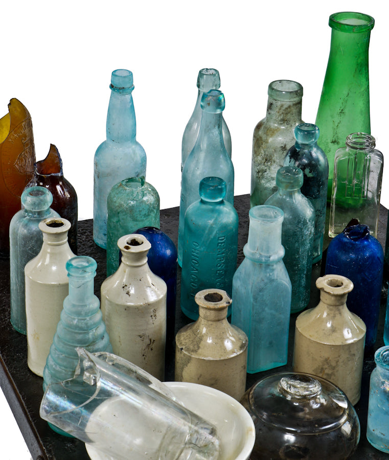 hard to find intact and all original privy dug crude nineteenth century blue aqua glass beehive style pepper sauce bottle fabricated by unknown makers.