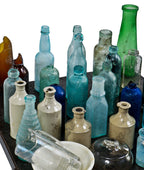 hard to find intact and all original privy dug crude nineteenth century blue aqua glass beehive style pepper sauce bottle fabricated by unknown makers.