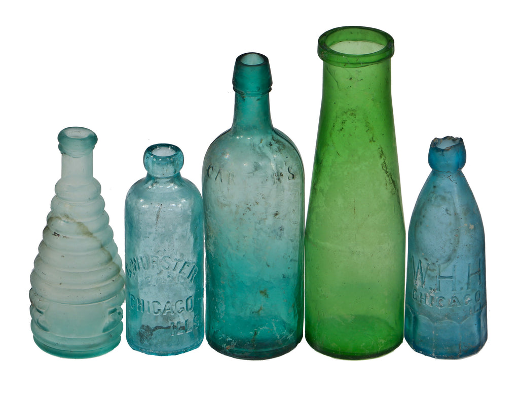 hard to find intact and all original privy dug crude nineteenth century blue aqua glass beehive style pepper sauce bottle fabricated by unknown makers.