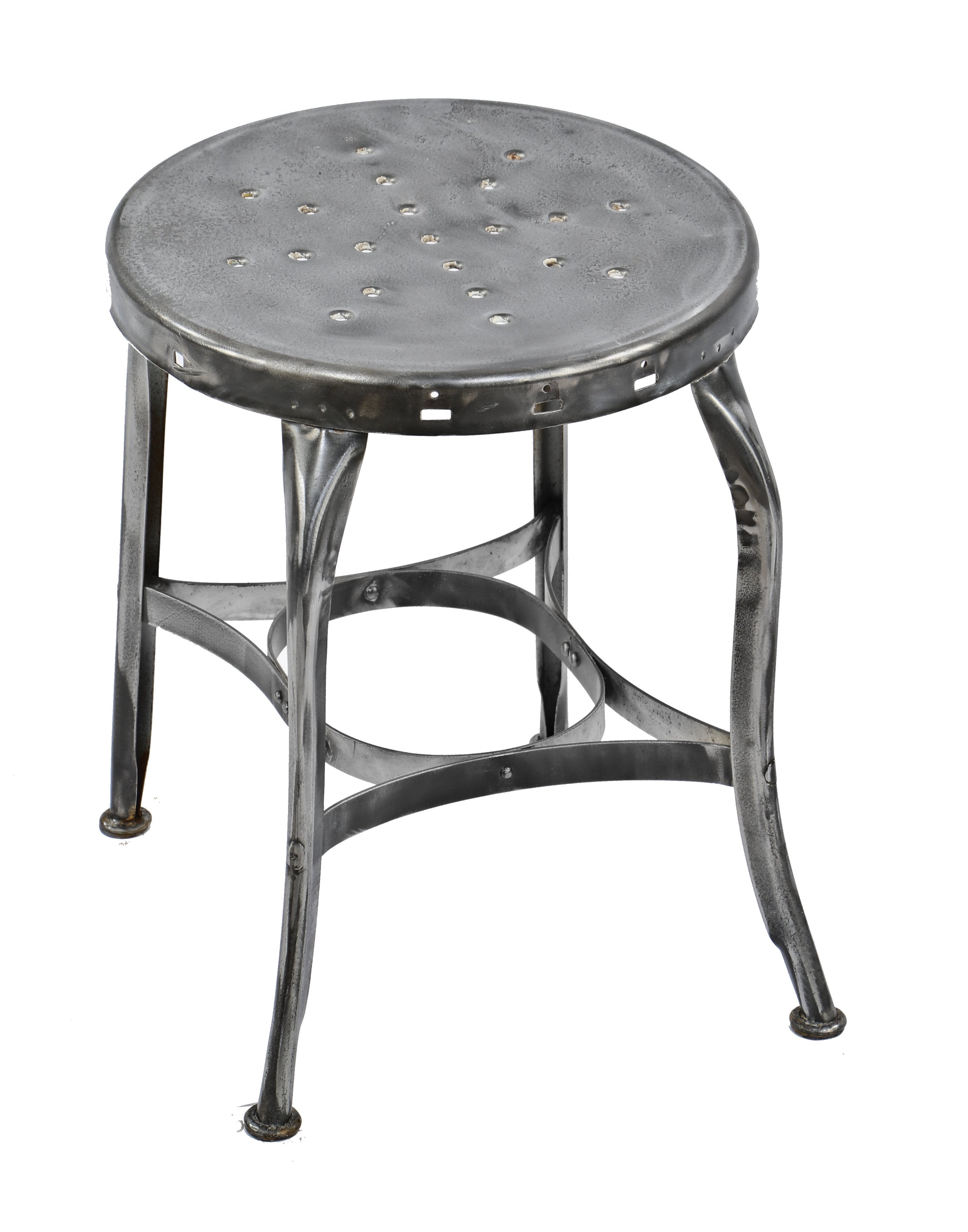 single c. 1910-15 antique american industrial refinished brushed metal pressed and folded steel four-legged stationary stool with a perforated seat