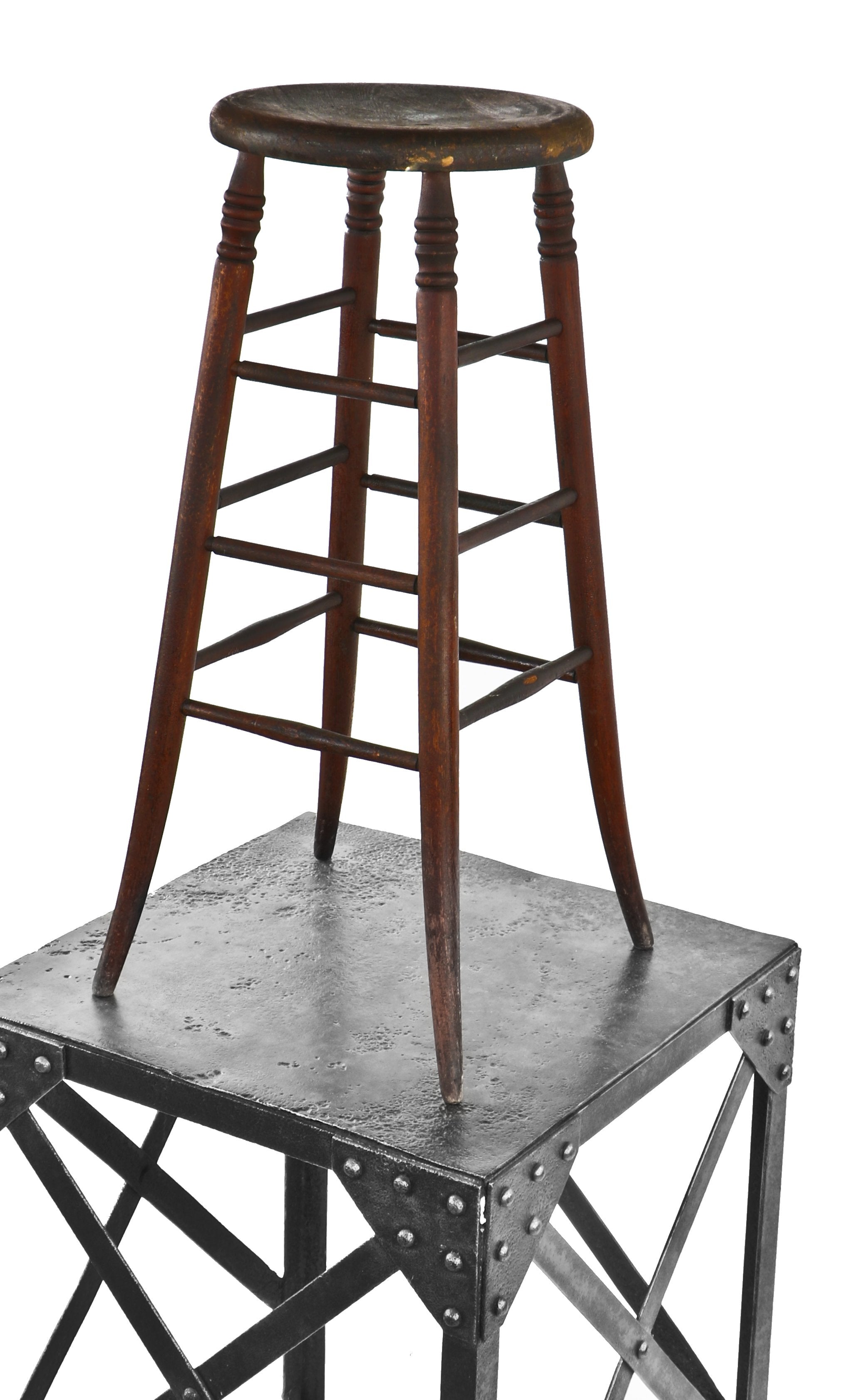 all original single turn of the century antique american solid birch wood tall four-legged darkly stained architect's drafting stool with slightly flared feet