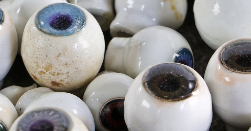 huge assortment of original c. 1940's-1950's american vintage industrial white glazed ceramic doll head eyeballs with multi-colored iris insets