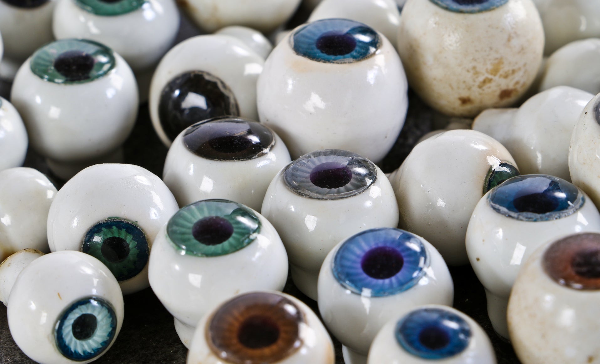 huge assortment of original c. 1940's-1950's american vintage industrial white glazed ceramic doll head eyeballs with multi-colored iris insets