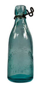 original chicago privy dug mid-1870's blue aqua glass embossed soda bottle with intact wire bail manufactured for chicago bottlers charles and william hausburg.