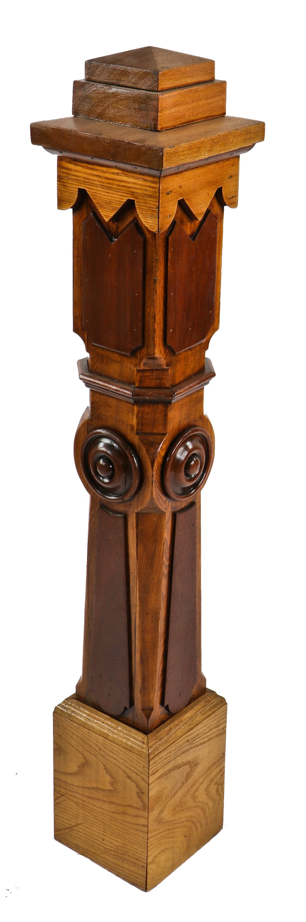 single structurally sound and finely crafted 19th century varnished oak and black walnut wood freestanding newel post with rondels and pyramidal-shaped top