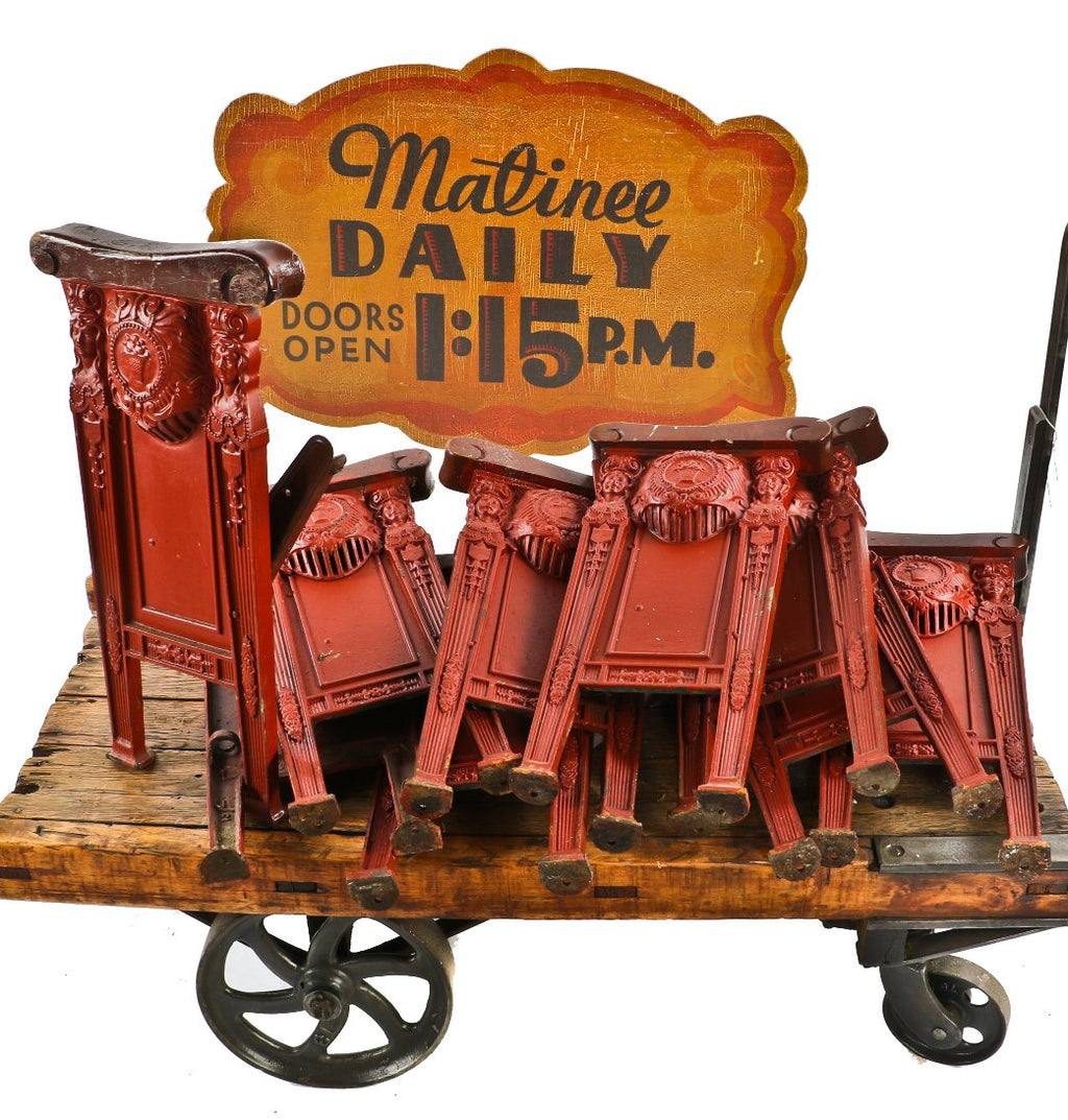 one of several matching original and intact brushed metal cast iron gethsemane missionary baptist church building figural theater seat ends with hardwood armrests