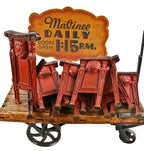 one of several matching original and intact brushed metal cast iron gethsemane missionary baptist church building figural theater seat ends with hardwood armrests