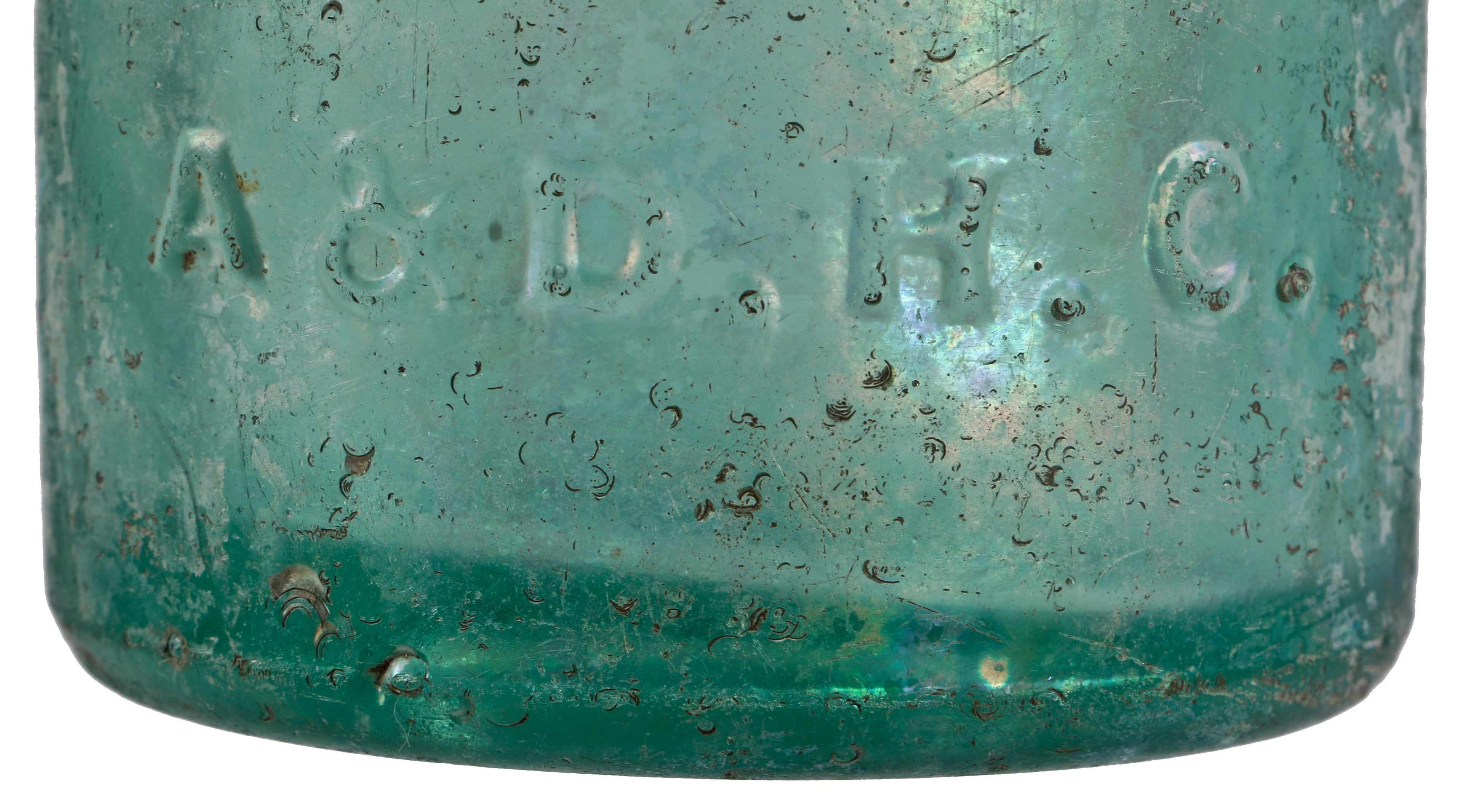 rare and intact privy dug light green teal pony style soda bottle with applied blob top manufactured for chicago bottlers august, william, and frederick lang.