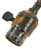 single hard to find early 20th century oxidized copper finish bent tubular brass metal faries bracket arm with the original general electric shell socket