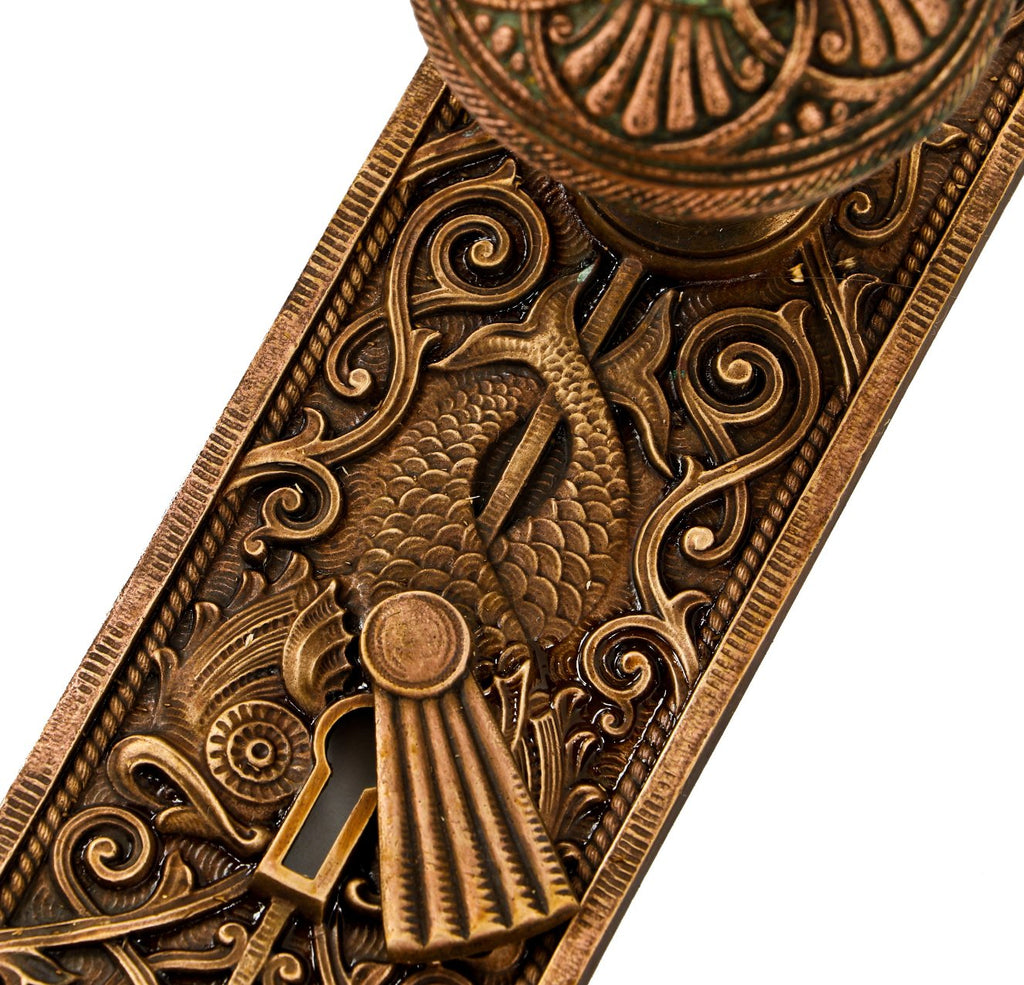 very rare and visually striking antique american venetian building interior ornamental cast bronze passage door hardware with intact swinging keyhole cover