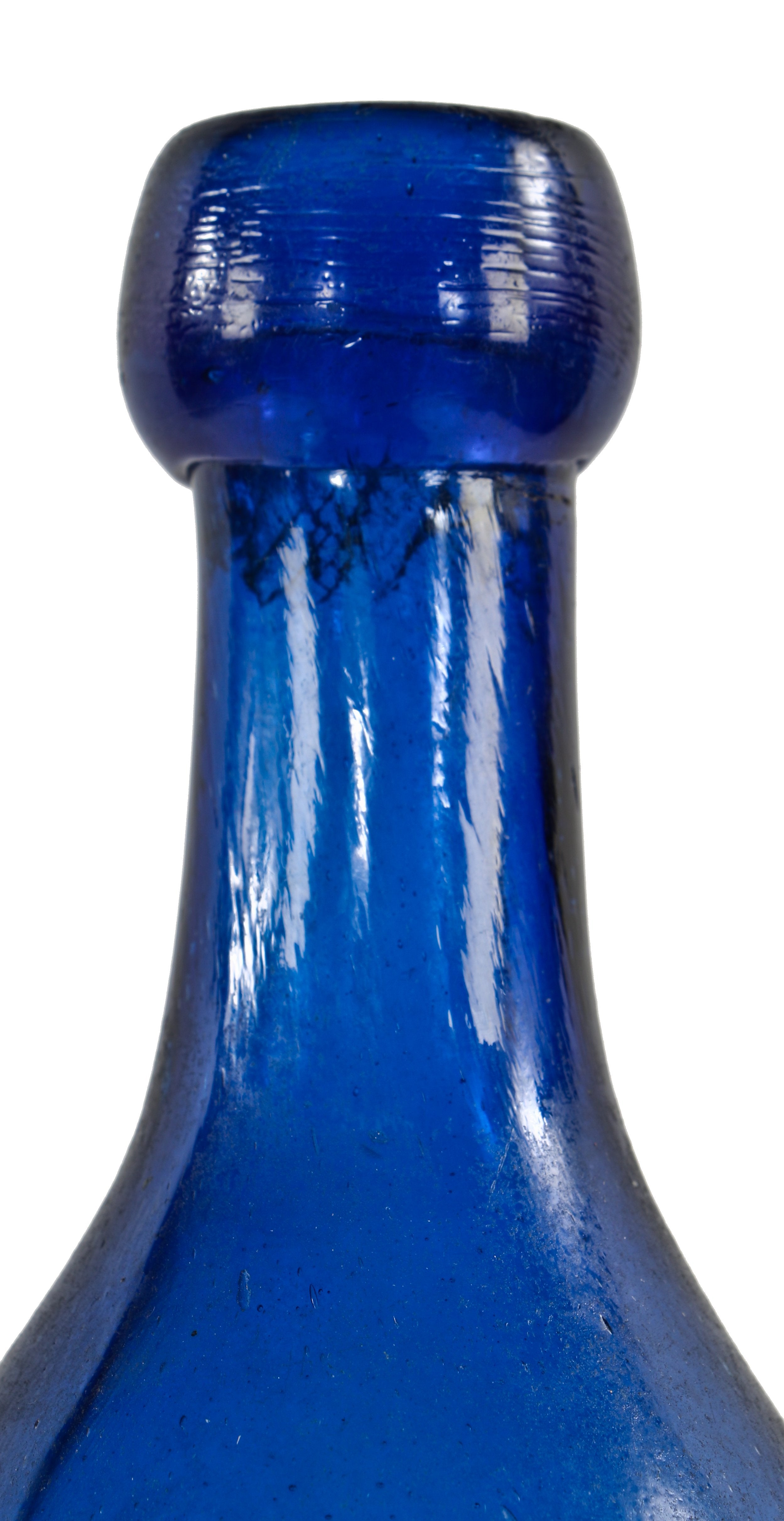 all original hard to find c. 1849-1853 dark cobalt blue iron-pontiled privy dug soda bottle manufactured for john and alexander dearborn in new york.