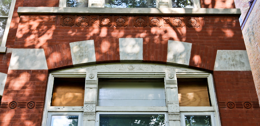 original 19th century antique american victorian era pressed red terra cotta ornamental freemont street house exterior face brick or block with "bullseye" design motif