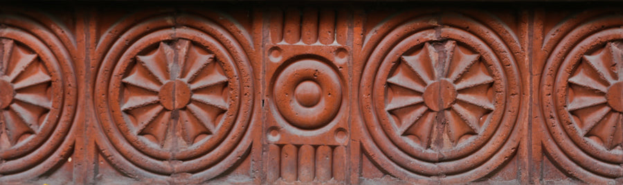 original 19th century antique american victorian era pressed red terra cotta ornamental freemont street house exterior face brick or block with "bullseye" design motif