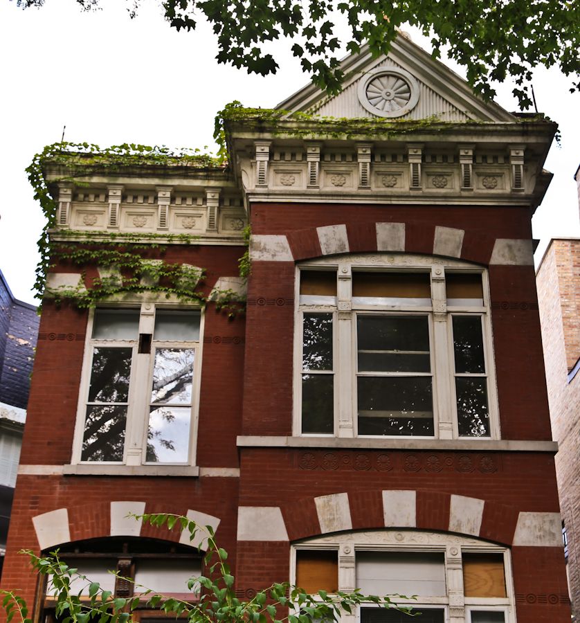 oversied 1880s american victorian era galvanized sheet iron exterior residential circular-shaped "sunburst" roofline cornice rondel with crazed white paint