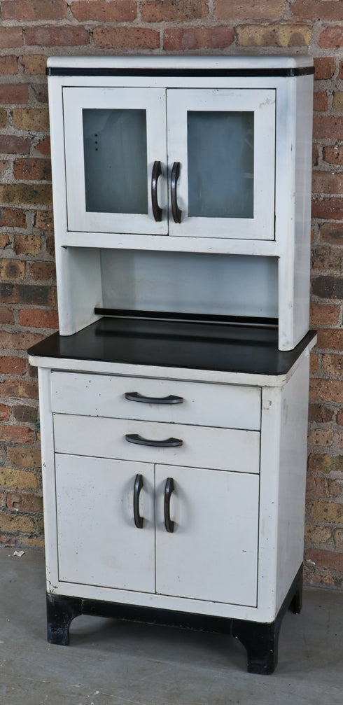 late 1930's or early 1940's american antique medical streamlined style all original "sani" white enameled steel doctor examination room supply cabinet with black bakelite handles