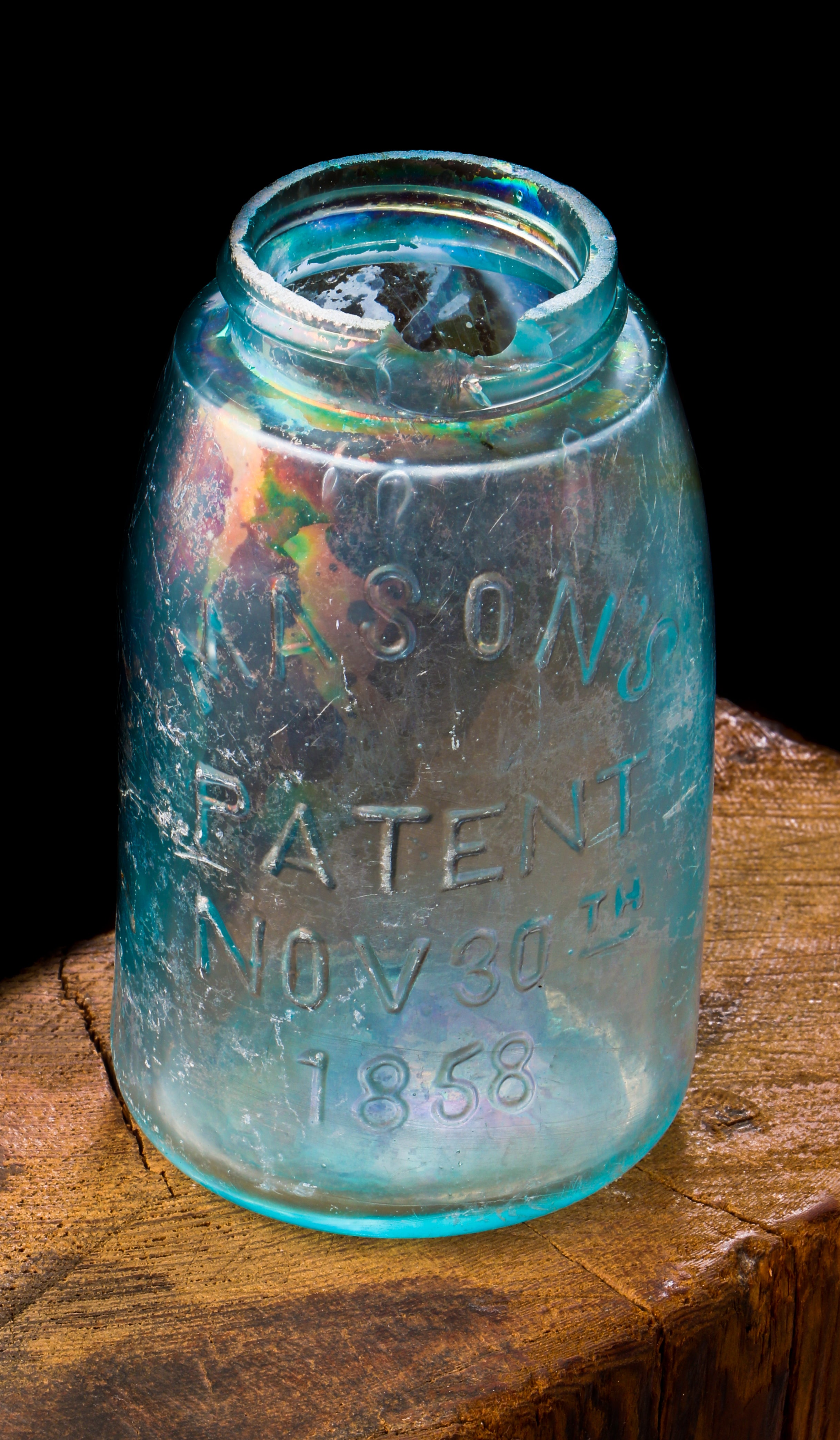 original antique dug blue aqua 'midget' mason jar manufactured by the hero fruit jar company.