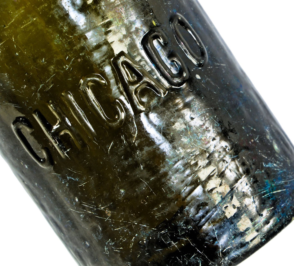 original and intact pre-prohibition era c. 1890's "wm pfeifer" hard to find olive green colored glass slender st. louis weiss shaped bottle dug from a chicago area landfill.