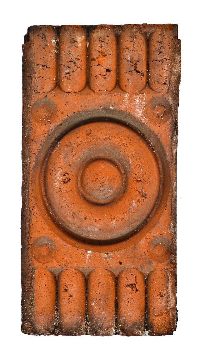 original 19th century antique american victorian era pressed red terra cotta ornamental freemont street house exterior face brick or block with "bullseye" design motif