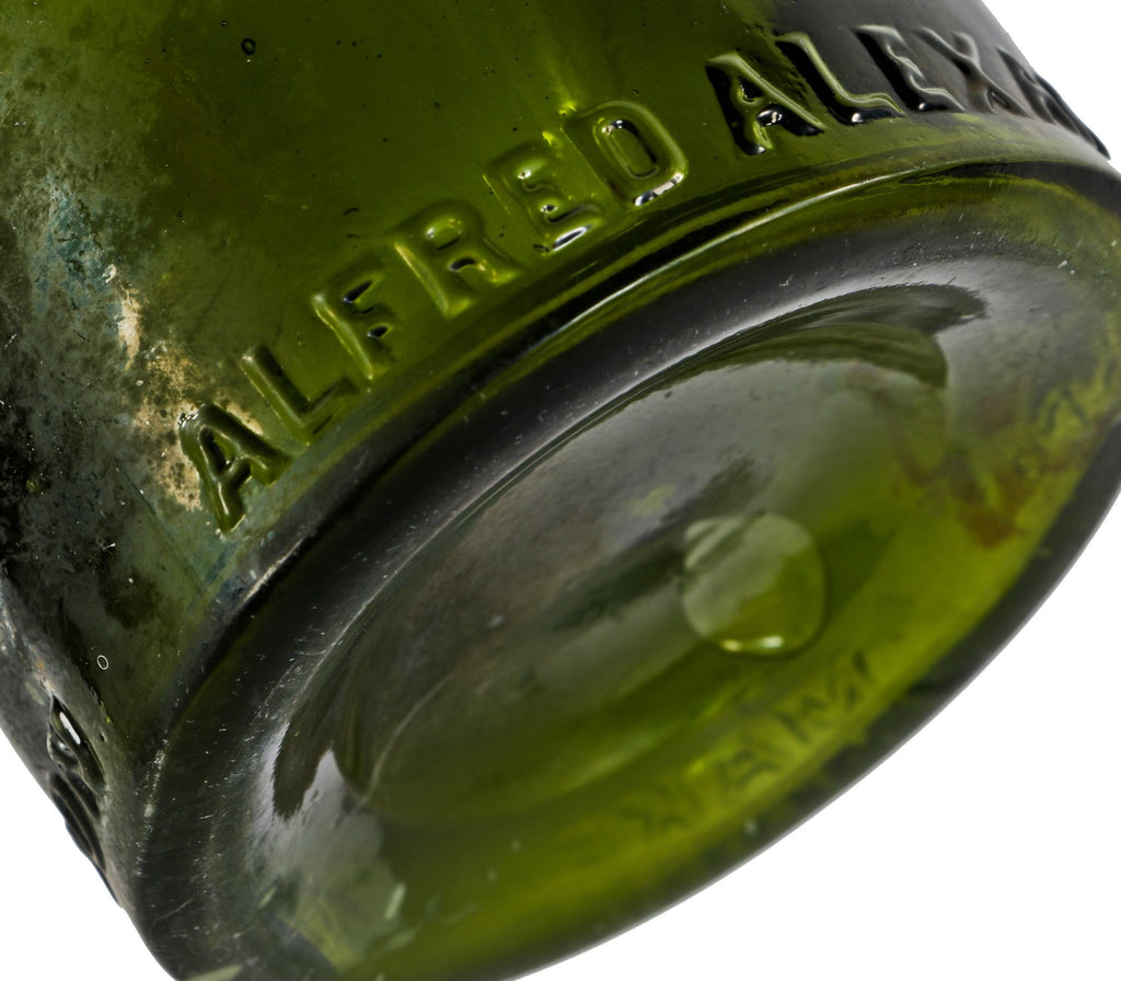 exceptional all original and intact hard to find mid 1870's-early 1880's medium olive green john lomax quart bottle discovered long ago in chicago's douglas park lagoon