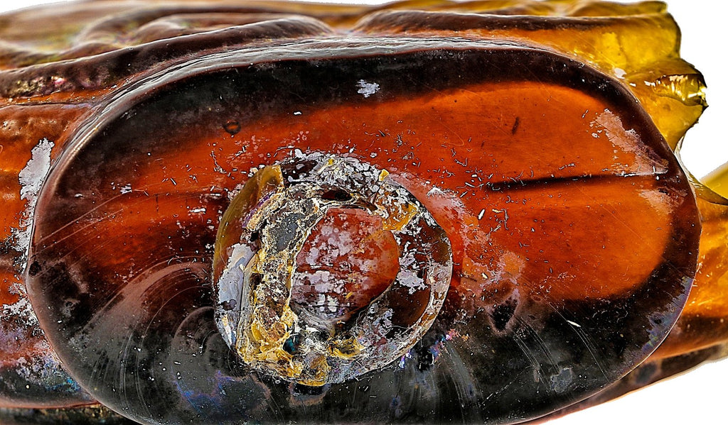 hard to find antique c. 1850's fragment of a decorative glass golden amber scroll flask dug from a chicago privy pit.