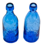 nearly identical of original and intact c. 1870's-1880's cobalt blue squat blobtop soda bottles manufactured for chicago bottler john lomax.