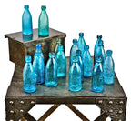 large lot of nearly 20 similar c. 1860's-1870's original chicago privy-dug william h. hutchinson cobalt and aqua blue paneled or "mug base" soda or mineral water bottles