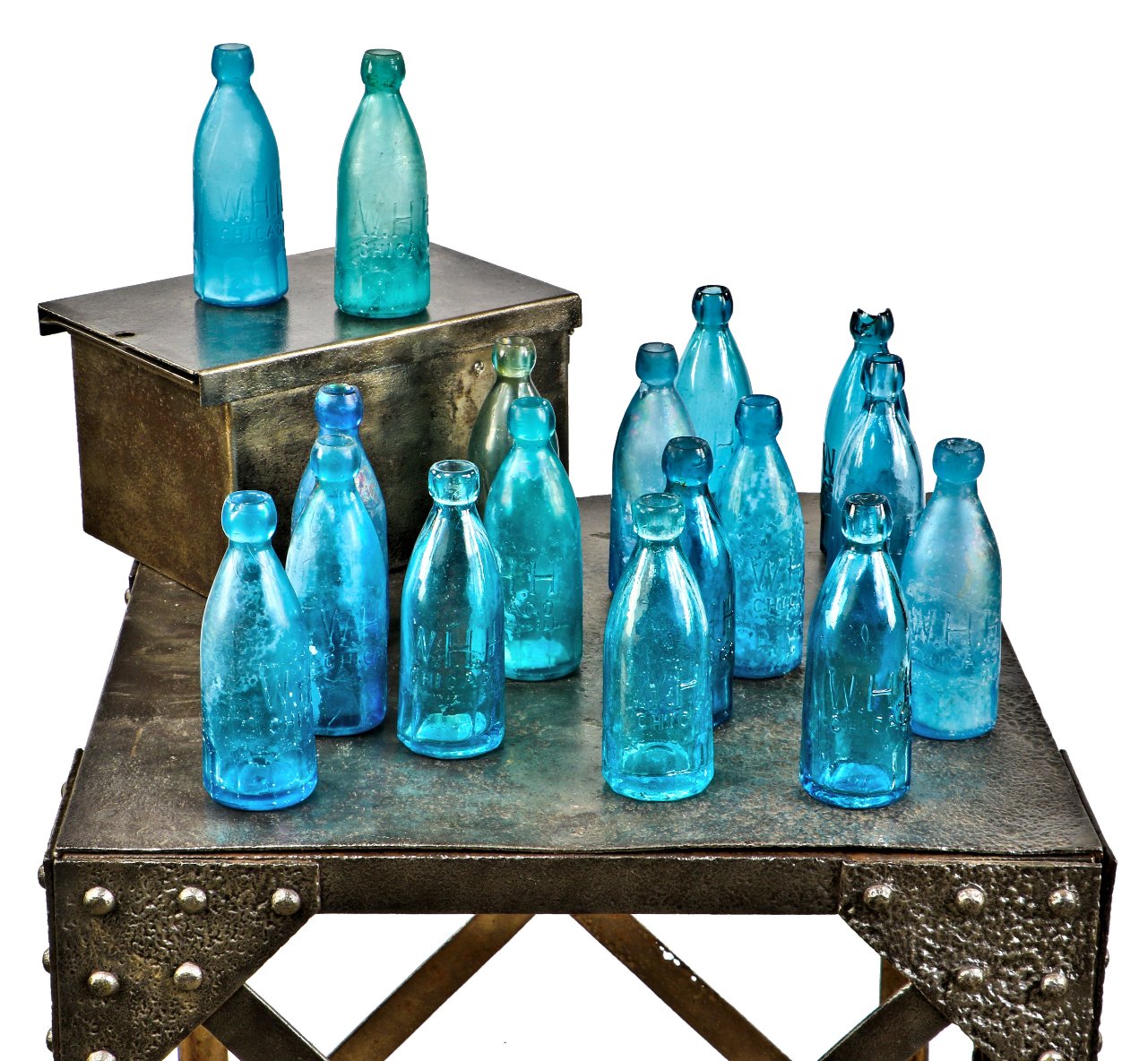large lot of nearly 20 similar c. 1860's-1870's original chicago privy-dug william h. hutchinson cobalt and aqua blue paneled or "mug base" soda or mineral water bottles