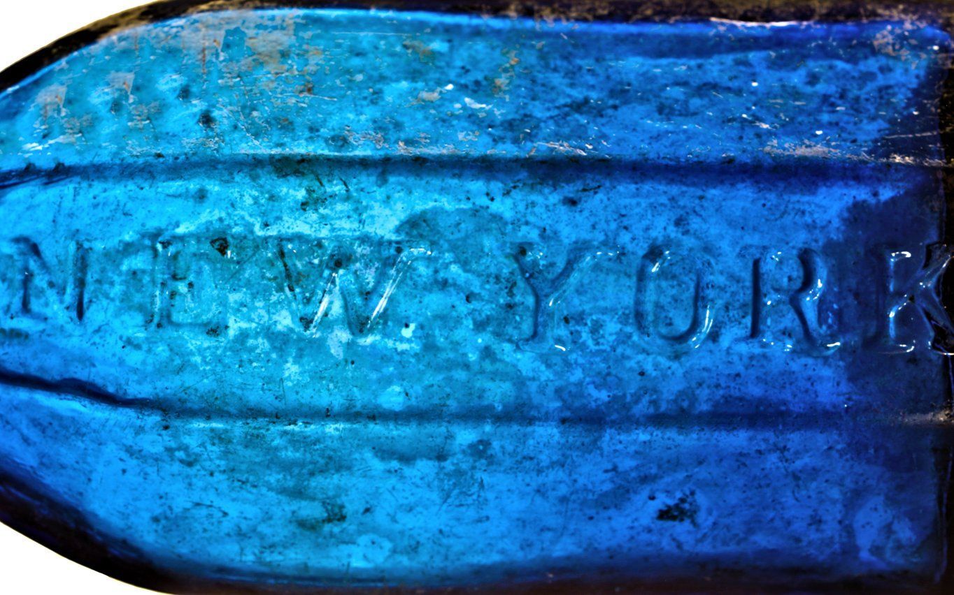 privy dug mid-nineteenth century richly colored deep sapphire blue glass 8-sided mineral water bottle manufactured for j. boardman & company in new york