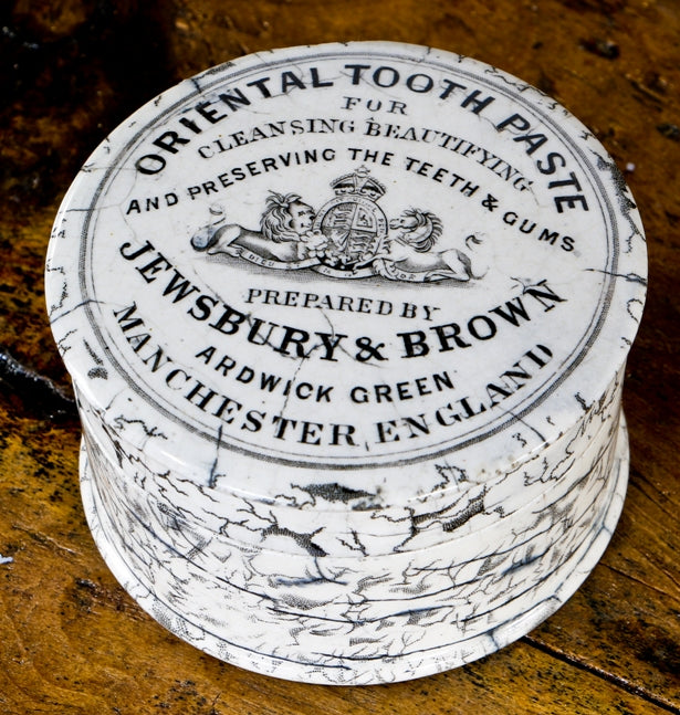 original and intact chicago dug pot lid for "oriental toothpaste" manufactured by  jewsbury & brown, in manchester, england.