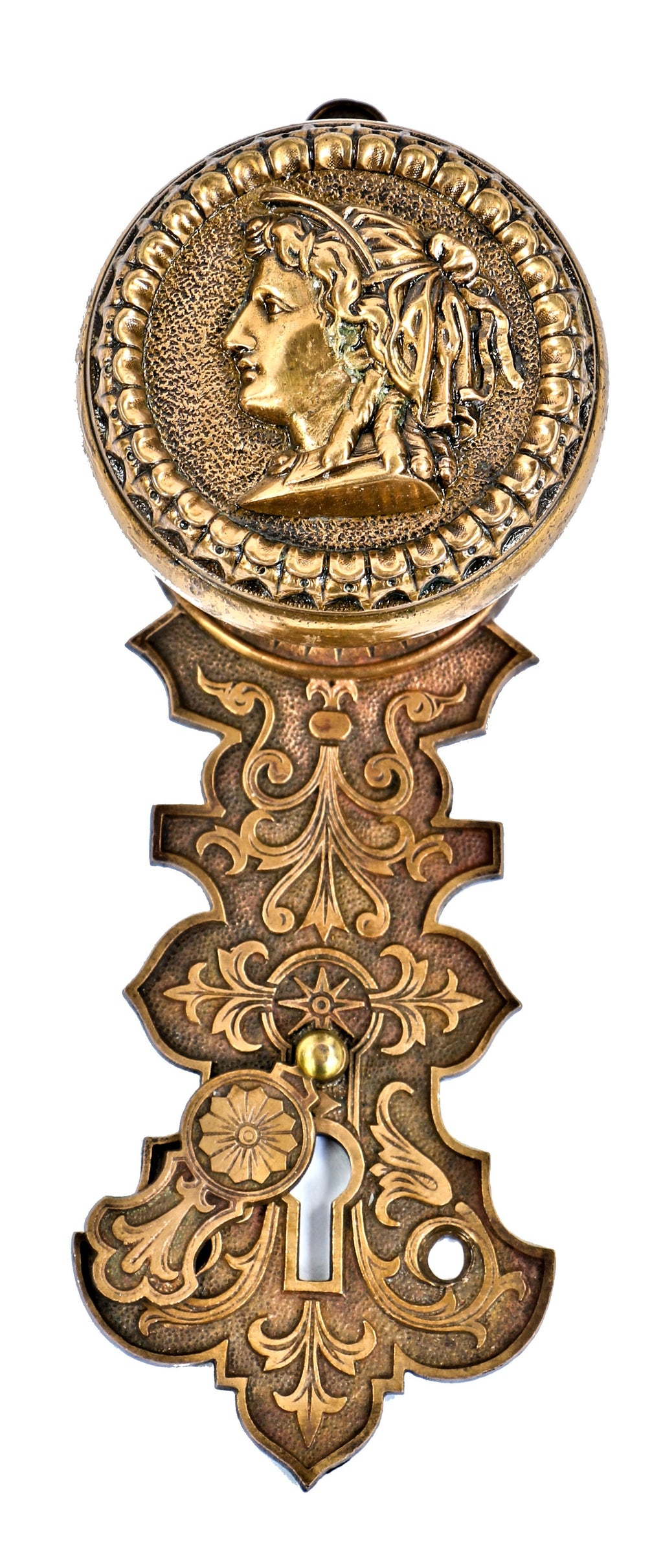 original and intact victorian era antique american cast bronze figural portrait doorknob and matching escutcheon with swinging keyhole cover fabricated by the metallic compression casting company