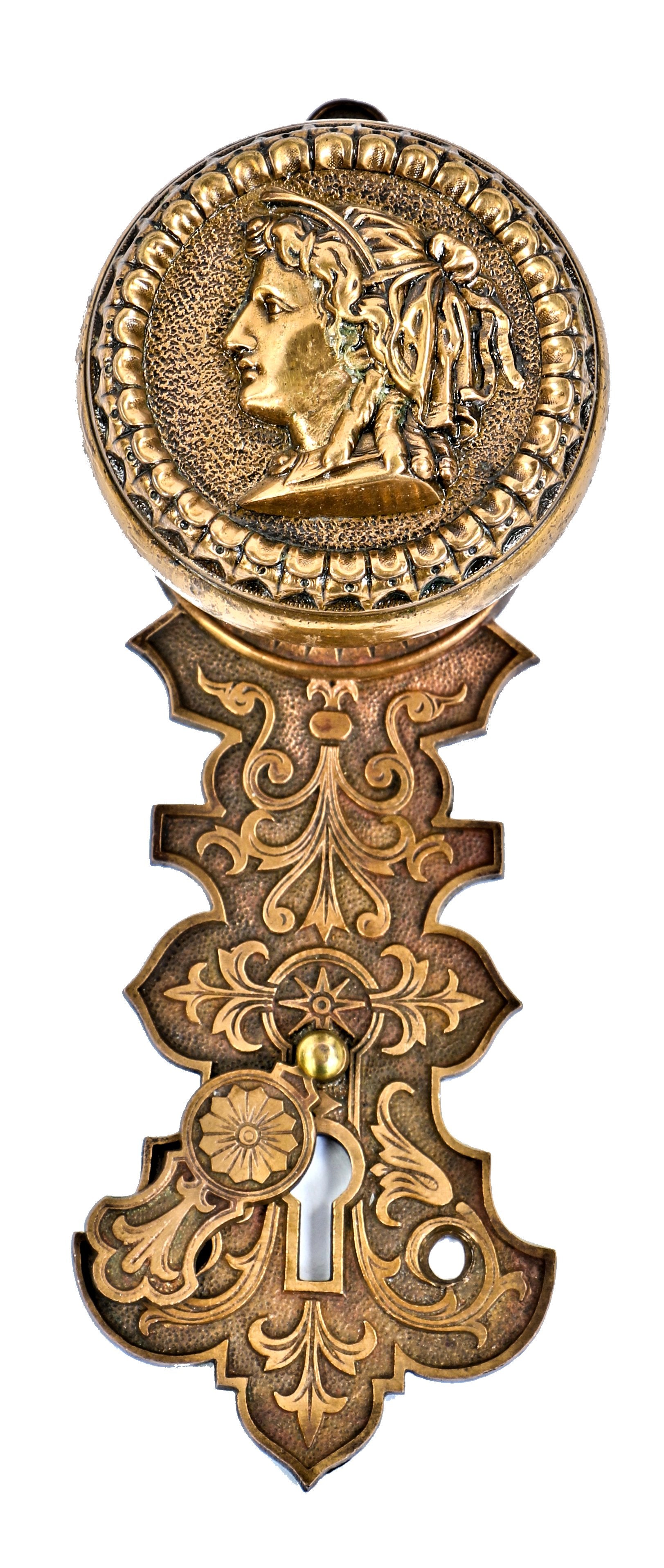 original and intact victorian era antique american cast bronze figural portrait doorknob and matching escutcheon with swinging keyhole cover fabricated by the metallic compression casting company