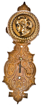 original finely detailed 19th century american victorian era "plumed helmet" figural knight doorknob with matching oversized escutcheon containing swinging keyhole cover