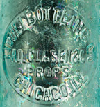 original and intact privy dug antique c.1878-1879 aqua "tivoli bottling co" slope-shouldered quart beer bottle manufactured for chicago bottlers adolph d. clasen and peter grube.
