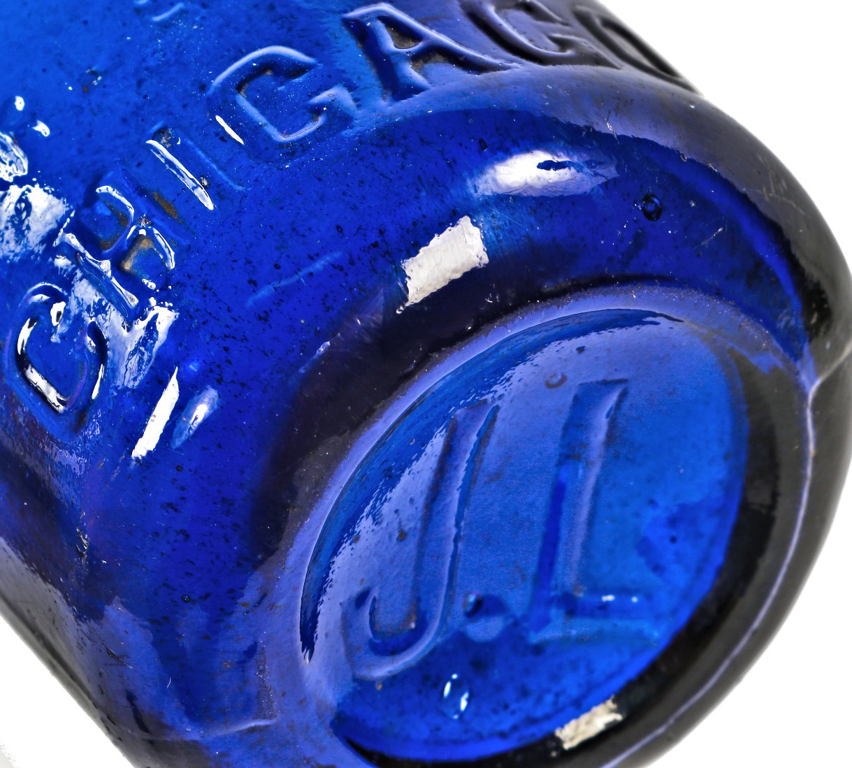 original and intact nineteenth century vibrant electric blue hutchinson shaped bottle with original patent spring stopper manufactured for chicago bottling giant j.a. lomax